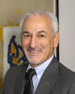 Mr. Robert D. Martinez